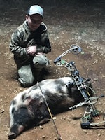 10 year old with bow takes down hog